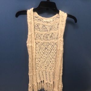 Long, cream-colored Boho Vest